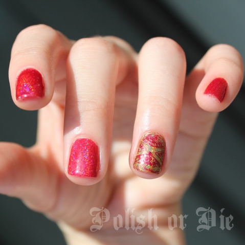 holographic red and gold manicure with fan motif stamping
